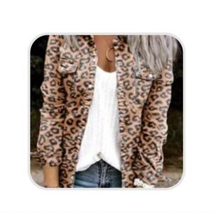 New XL. Women’s Leopard  button up shirt with long sleeves and two front pockets